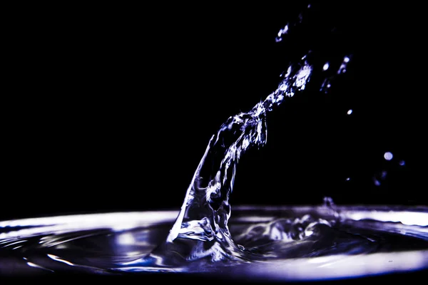 Water splashes isolated on black — Stock Photo, Image