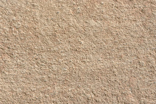 均匀的浅褐色砂岩墙质感特写平滑光 — 图库照片