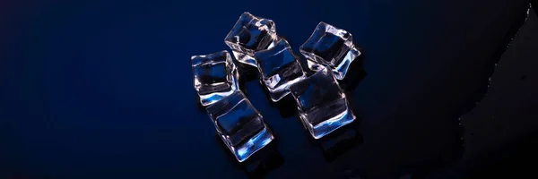 Wet Ice Cubes Blue Background Top View — Zdjęcie stockowe