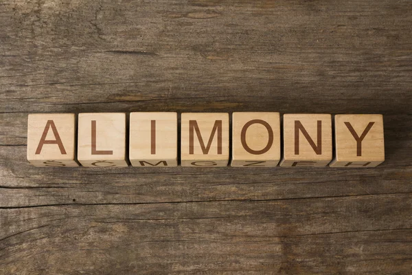 The word of ALIMONY on wooden cubes — Stock Photo, Image