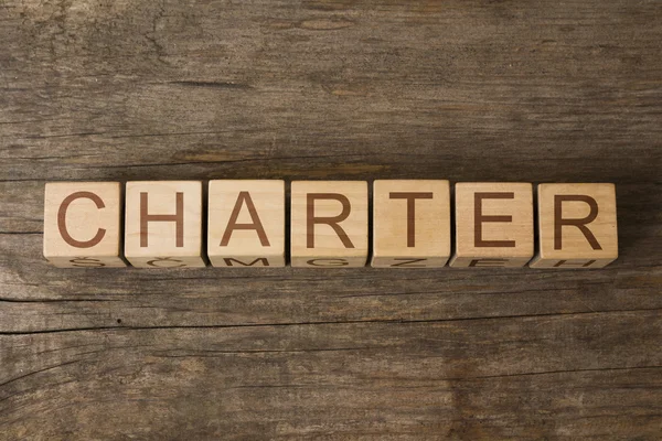 Slovo Charty na dřevěných kostek — Stock fotografie