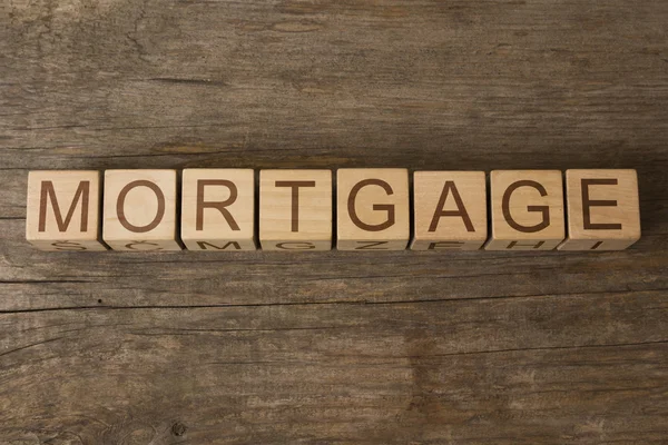 MORTGAGE parola su un cubo di legno — Foto Stock