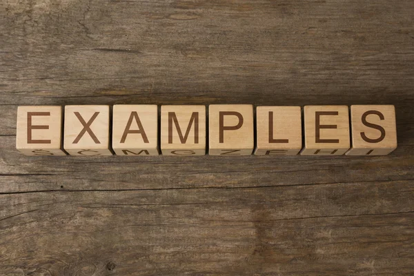 EXAMPLES word written on wooden cubes — Stock Photo, Image