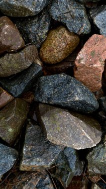 Close-up of gravel stones, large fraction, textured background, natural rocks, abstract texture, desktop wallpaper, phone background, macro, detail, nature, outdoors