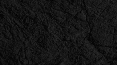 Dark background close up texture of natural stone
