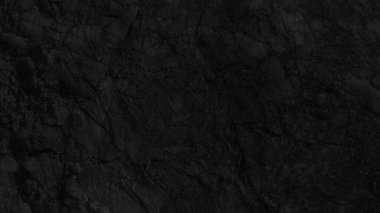 Dark background close up texture of natural stone