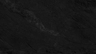 Dark background close up texture of natural stone