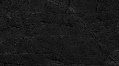 Dark background close up texture of natural stone
