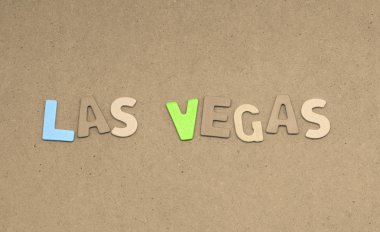 Kahverengi arka plan üzerinde las vegas metin