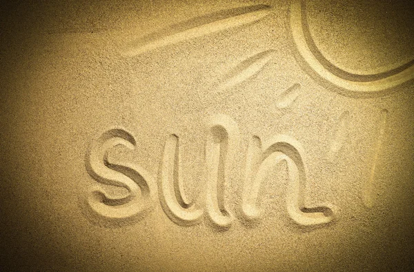 Palabra del sol en la arena —  Fotos de Stock