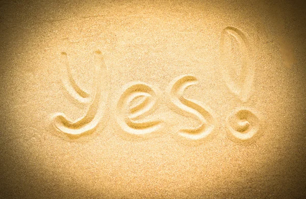 Yes word on sand — Stock Photo, Image