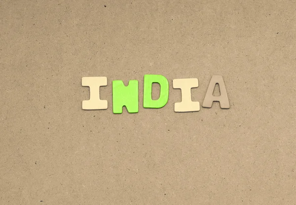 India text on brown background — Stock Photo, Image