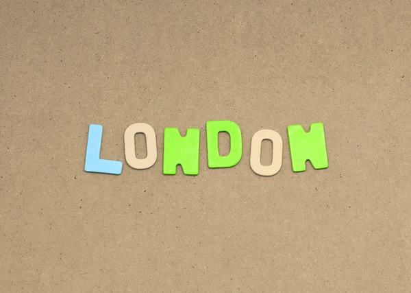 伦敦文本上棕色背景 — 图库照片
