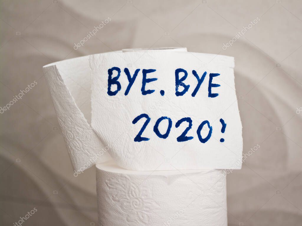 Conceptual image of toilet paper, symbol of covid-19 crisis and pandemia in 2020. Abstract image, saying goodbye to the bad year, leaving the past behind, hoping for better.