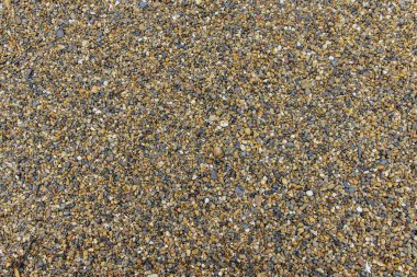 Doğal yontulmuş taş arka plan. Doğal gri granit parçaları, ezilmiş taş ya da ezilmiş taş dokusu, üst yaşam.