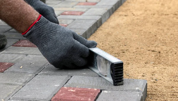 Hands Worker Gloves Laying Concrete Blocks Rubber Hammer — Stock Photo, Image