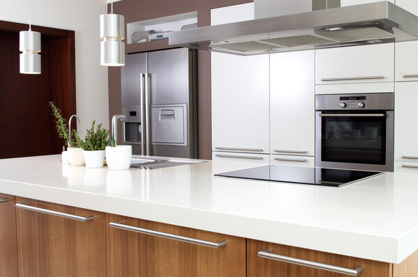 Modern kitchen with household goods.