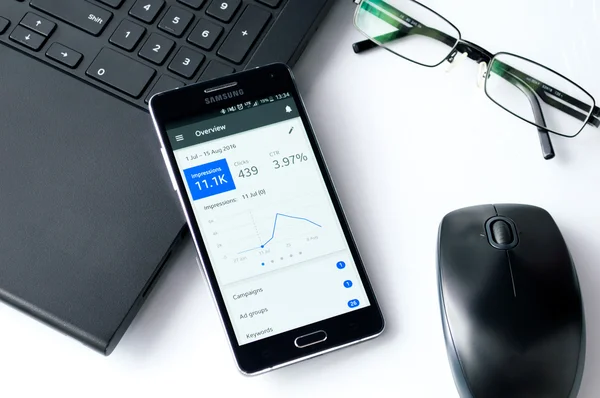 Samsung A5 with Google Adwords application laying on desk. — Stock Photo, Image