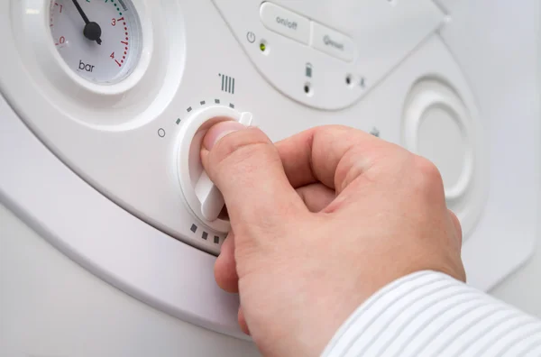 Setting the central heating level in gas furnace panel — Stock Image Setting the central heating level in gas furnace panel Stock Image