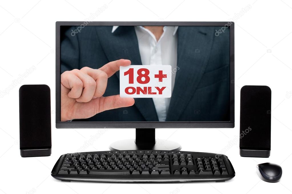 Man on desktop computer monitor showing card with sign 