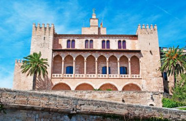 Mallorca, Balearic Islands: view of the walls of the old town with the iconic Royal Palace of La Almudaina, the fortified palace of Palma de Mallorca clipart