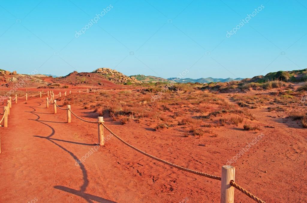 Menorca, Balearic Islands, Spain: the red sand and rocks on the