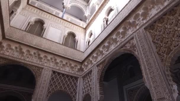 Seville, Andalusia, Spain - April 18, 2016: Alcazar, indoor gardens, courtyards and rooms — Stock Video