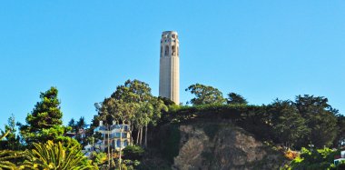 San Francisco, California, Usa: view of the Coit Tower, the art deco tower built of unpainted reinforced concrete in 1933 within Pioneer Park on the top of Telegraph Hill thanks to the benefactress Lillie Hitchcock Coit clipart