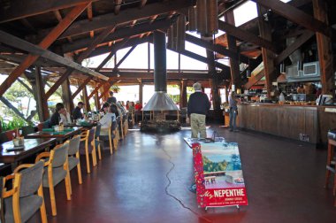 Big Sur, California, Usa: the interiors at the Nepenthe restaurant, a very famous restaurant since 1949 where in 1963 Elizabeth Taylor and Richard Burton filmed the folk dancing in The Sandpiper movie clipart