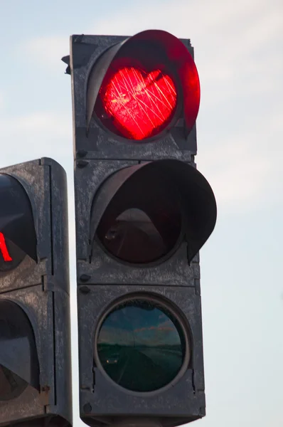 Iceland, Europe: a traffic light with red heart shaped seen in the city of Akureyri, famous as the capital of the north — ストック写真