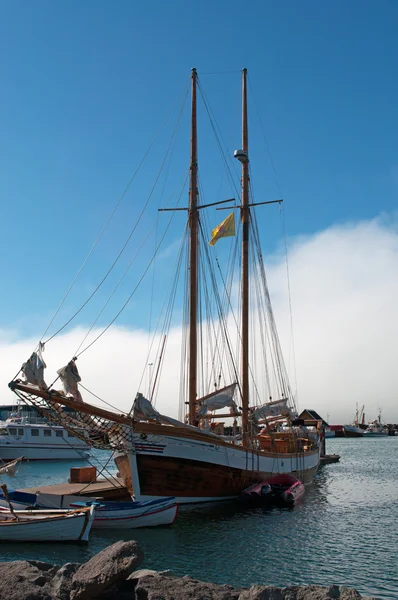 Iceland: a sailing ship in the port of Husavik — Stock Photo, Image