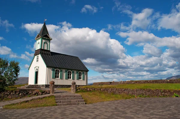 Iceland, Europe: Thingvallakirkja, the Thingvellir Church (1859) consecrated in the 11th century in Thingvellir national park, home of the Althing (national Parliament since 930 AD) and boundary between North American and Eurasian tectonic plates — 图库照片