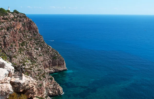 Formentera, Balearic Islands, Spain: aerial view of the Mediterranean Sea with La Mola Lighthouse, opened in 1861 on the top of a spectacular cliff — Stock Photo, Image