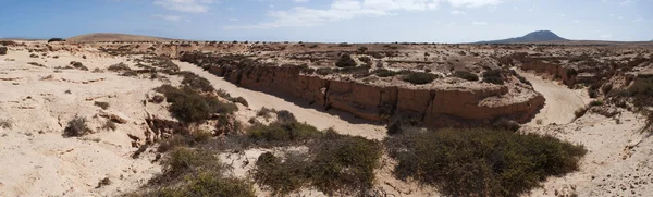 Fuerteventura, Canary Islands, Spain: aerial view of the Barranco de los Encantados (Canyon of the happy ones), also called Barranco de los Enamorados (Canyon of lovers), a little canyon in the northwest of the island — стоковое фото