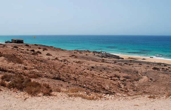 Fuerteventura, Isole Canarie, Spagna: veduta aerea della spiaggia di Piedra Playa, o spiaggia di El Castillo, una delle spiagge più famose della costa nord-occidentale, a sud del Castillo de el Toston (Torre o Castello di Toston) nel villaggio di El Cotillo — Foto Stock