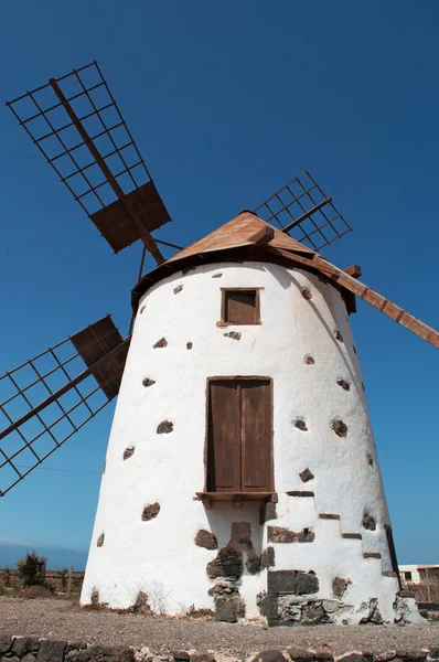 Fuerteventura, Canary Islands, Spain: view of the famous and traditional windmill in the village of El Roque, in the northwestern part of the island Stock Image