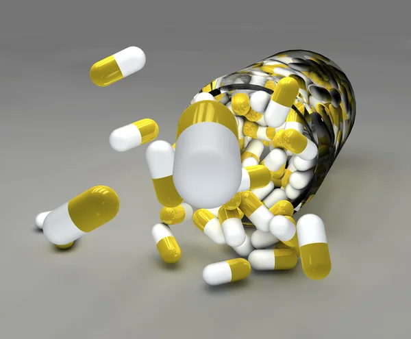 Spilled yellow and white pills — Stock Photo, Image