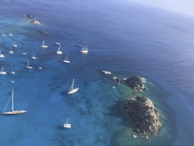 Gustavia harbor with sailboats clipart