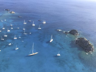 Gustavia harbor with sailboats clipart