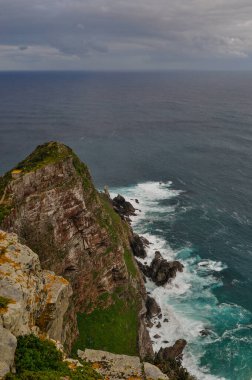South Africa: stormy weather under the old Cape Point lighthouse, the last cliff of Cape Point, the southeast corner of the Cape Peninsula close to Cape of Good Hope