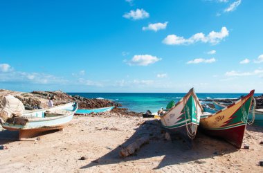 Socotra, Yemen, Middle East: fishing boats on the beach of the protected area of Ras Erissel, the eastern cape of Socotra, the meeting point of the Arabian sea and the Indian Ocean on the island od Socotra clipart