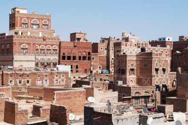 Yemen, Orta Doğu: Sana'a, Unesco Dünya Mirası, benzersiz saraylar ve taş evler ile sermayenin manzarası ateş tuğla ve beyaz alçı geometrik desenlerle süslenmiş