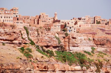 Yemen, Orta Doğu: kırmızı kayalar ve dekore edilmiş eski tepe evleri Kawkaban, antik ve müstahkem şehrin Şibam Vadisi'nde, Sana'a kuzeybatısında, havadan görünümü 