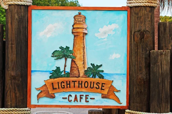 Miami: the sign of the Lighthouse Cafe at the Cape Florida Light, a lighthouse built in 1825 on Cape Florida at the south end of Key Biscayne in the Bill Baggs Cape Florida State Park — Stock Photo, Image