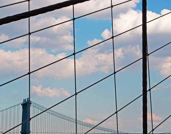 New York City, Usa, September 16, 2014: details of the Manhattan Bridge seen from the Brooklyn Bridge, two iconic landmarks of the Big Apple