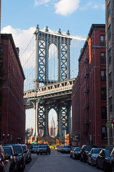 New York City, Usa, September 16, 2014: view of the Manhattan Bridge, a suspension bridge that crosses the East River, built by The Phoenix Bridge Company, designed by Leon Moisseiff and opened to traffic on December 31, 1909