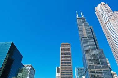 Chicago: looking up at the Willis Tower, known as Sears Tower, famous landmark 1729 feet high, from canal cruise on Chicago River