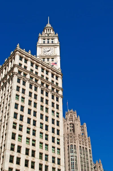 Chicago, United States of America, Usa: looking up at the Wrigley building, a skyscraper located directly across Michigan Avenue from the Tribune Tower on the Magnificent Mile, seen from a canal cruise on the Chicago River