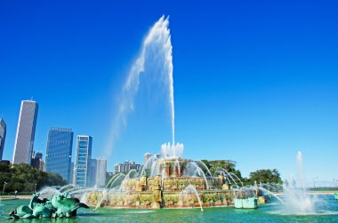 Chicago, Illinois, United States of America, Usa: the skyline of the city with view of the Buckingham Fountain, a landmark in the center of Grant Park, one of the largest fountains in the world clipart