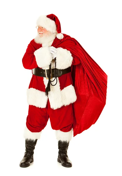 圣诞老人： 圣诞老人背着麻袋的礼物 — 图库照片